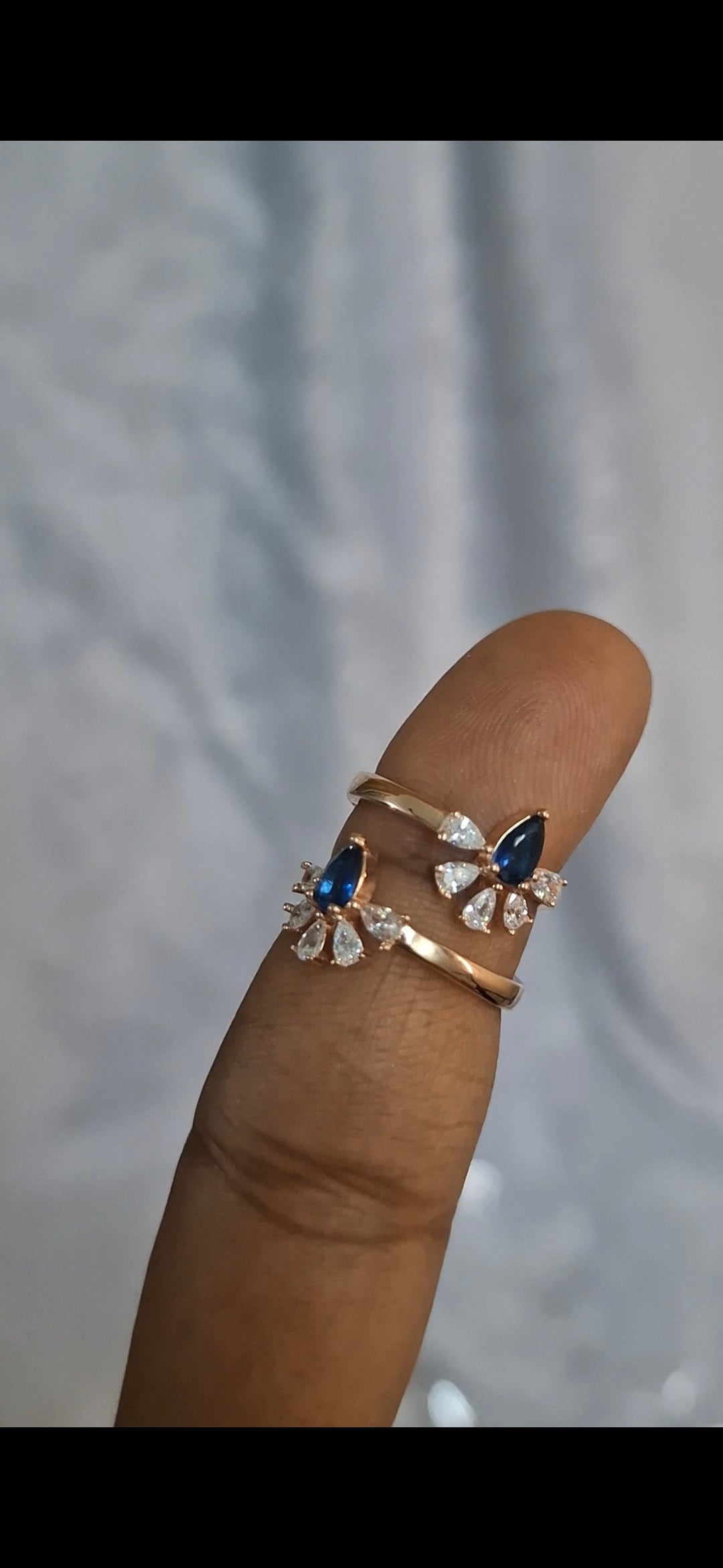 Blue crown toe rings